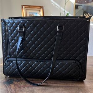 Black Quilted Tote Bag has built in lunch cooler. Brand new.